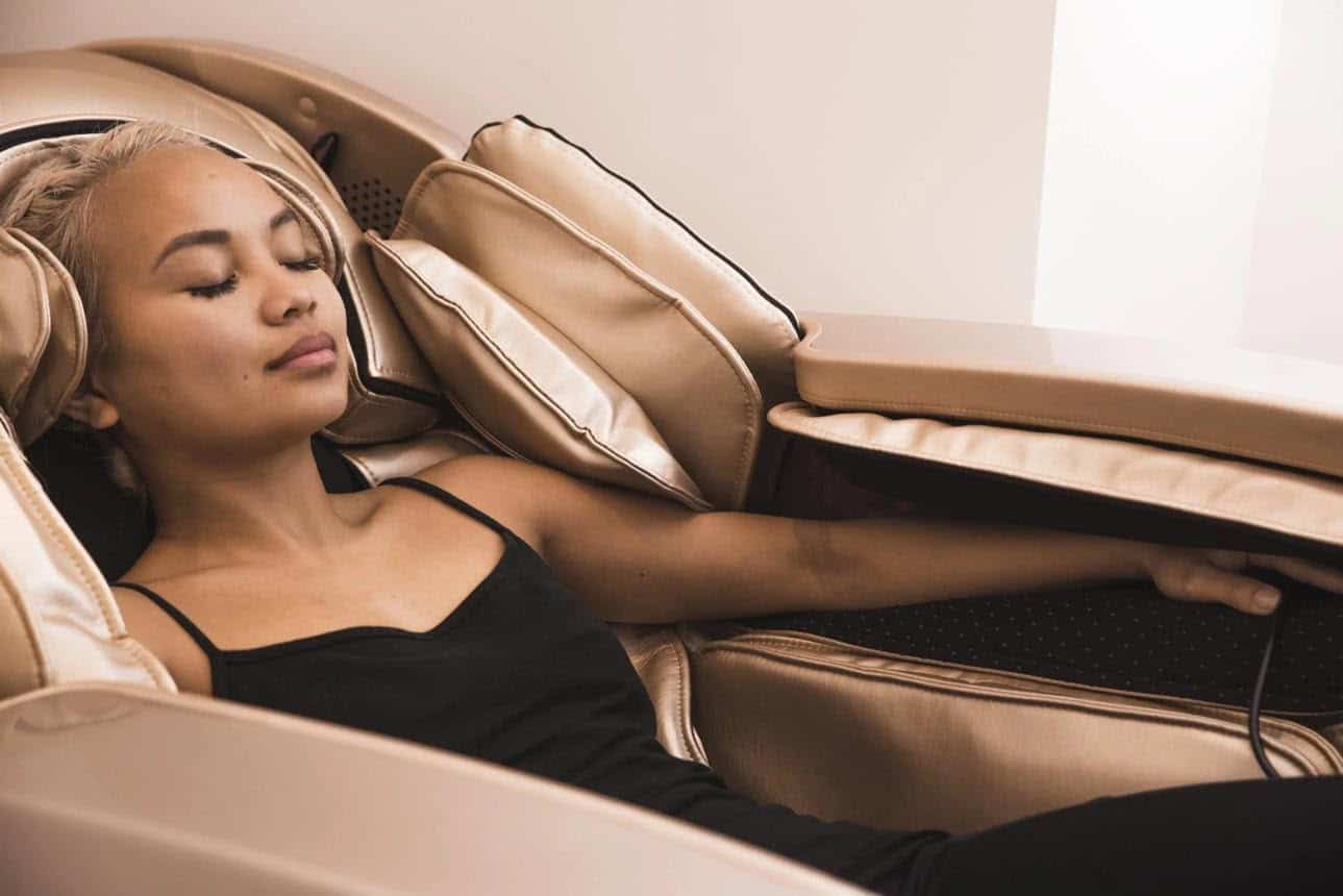A woman resting in a zero-gravity chair during a 1:1 nervous system reset