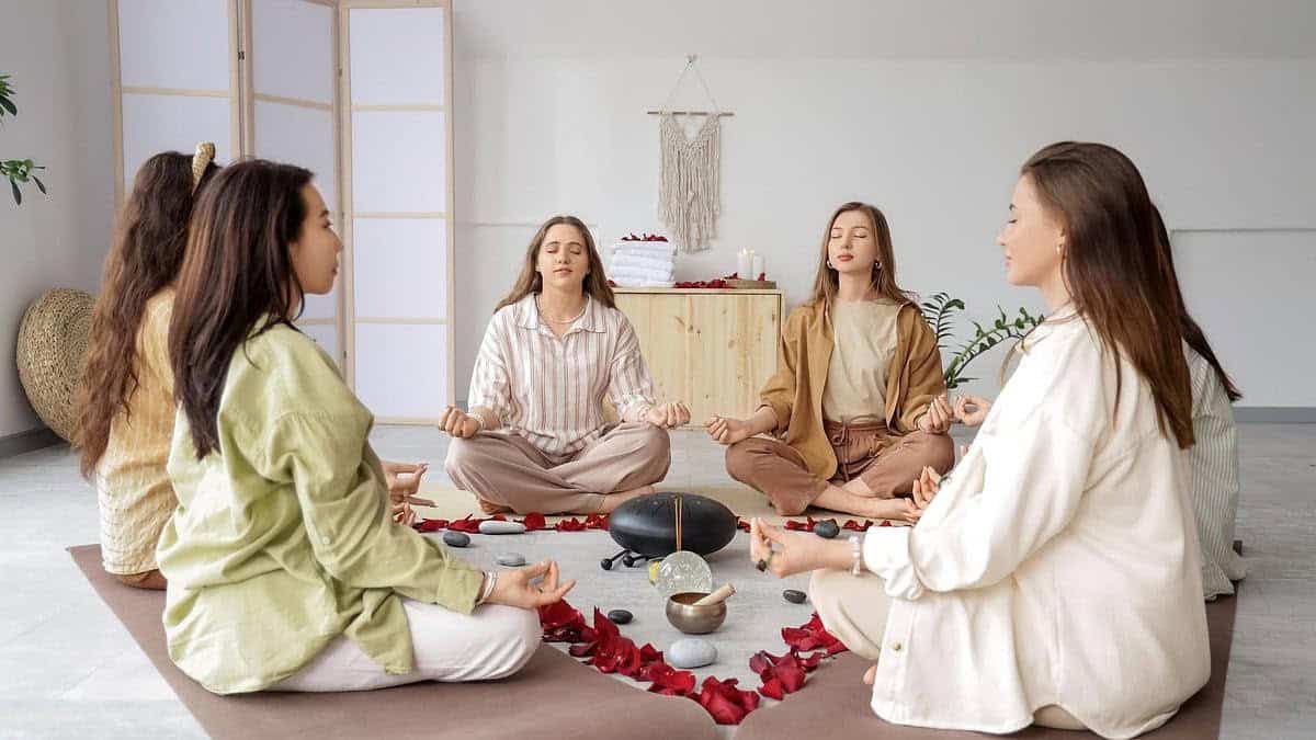 A group of women seated together in a guided session